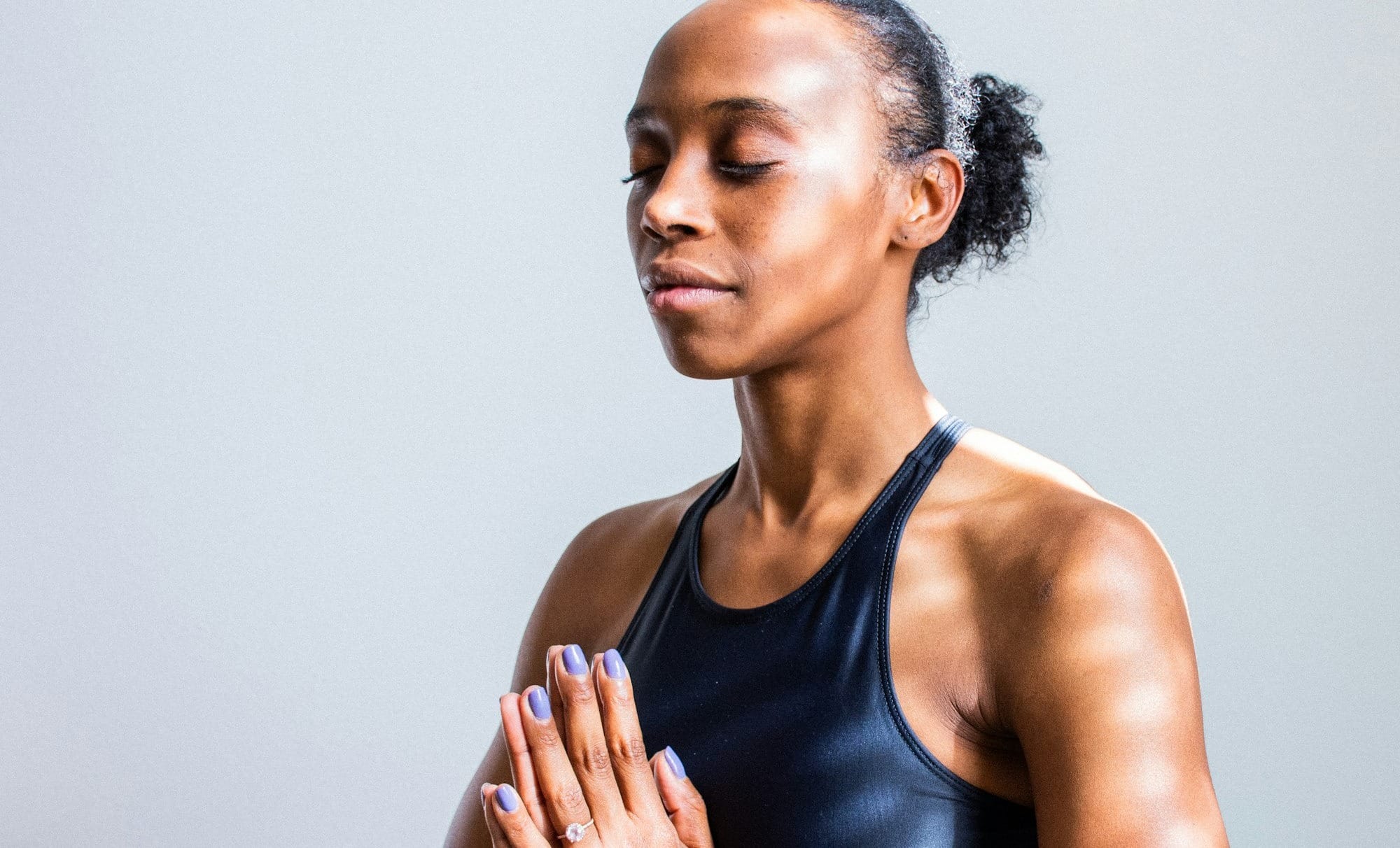 woman wearing black sports bra